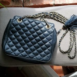 I MAGNIN navy bag with gold chain, and tassel